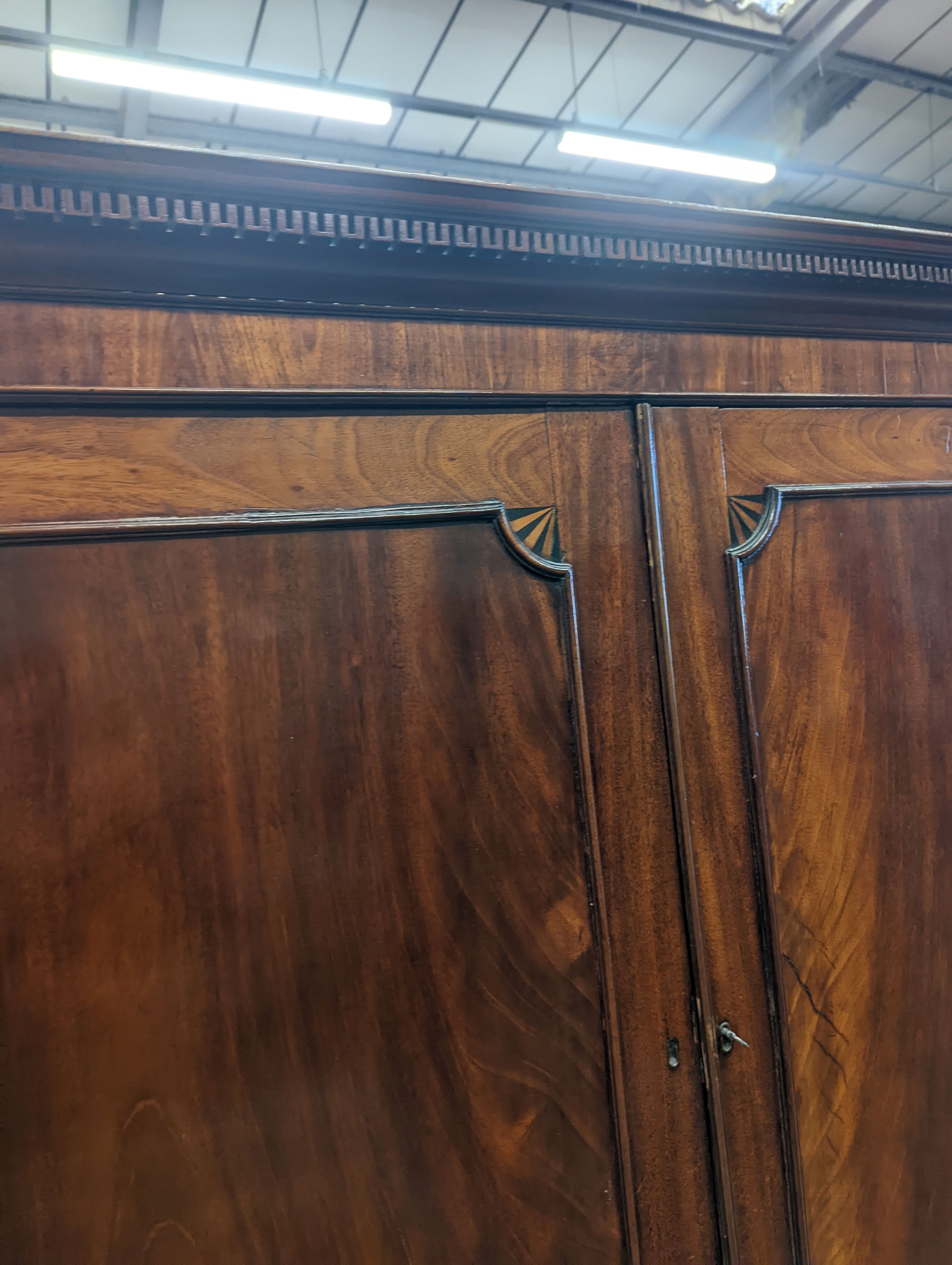 A George III mahogany linen press, width 124cm, depth 56cm, height 195cm